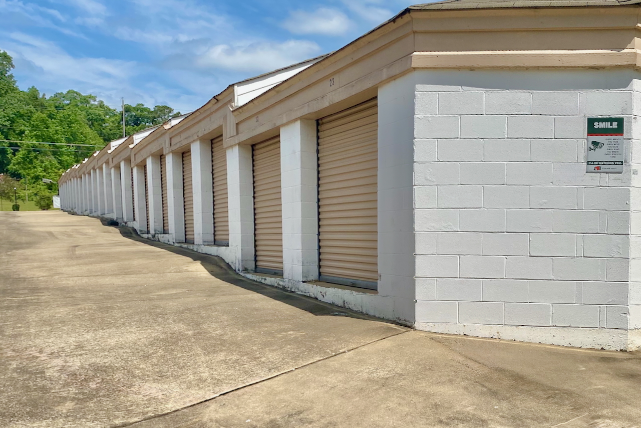Outdoor drive-up storage unit at 3205 Martin Luther King Jr Parkway S, Phenix City, AL with security fence