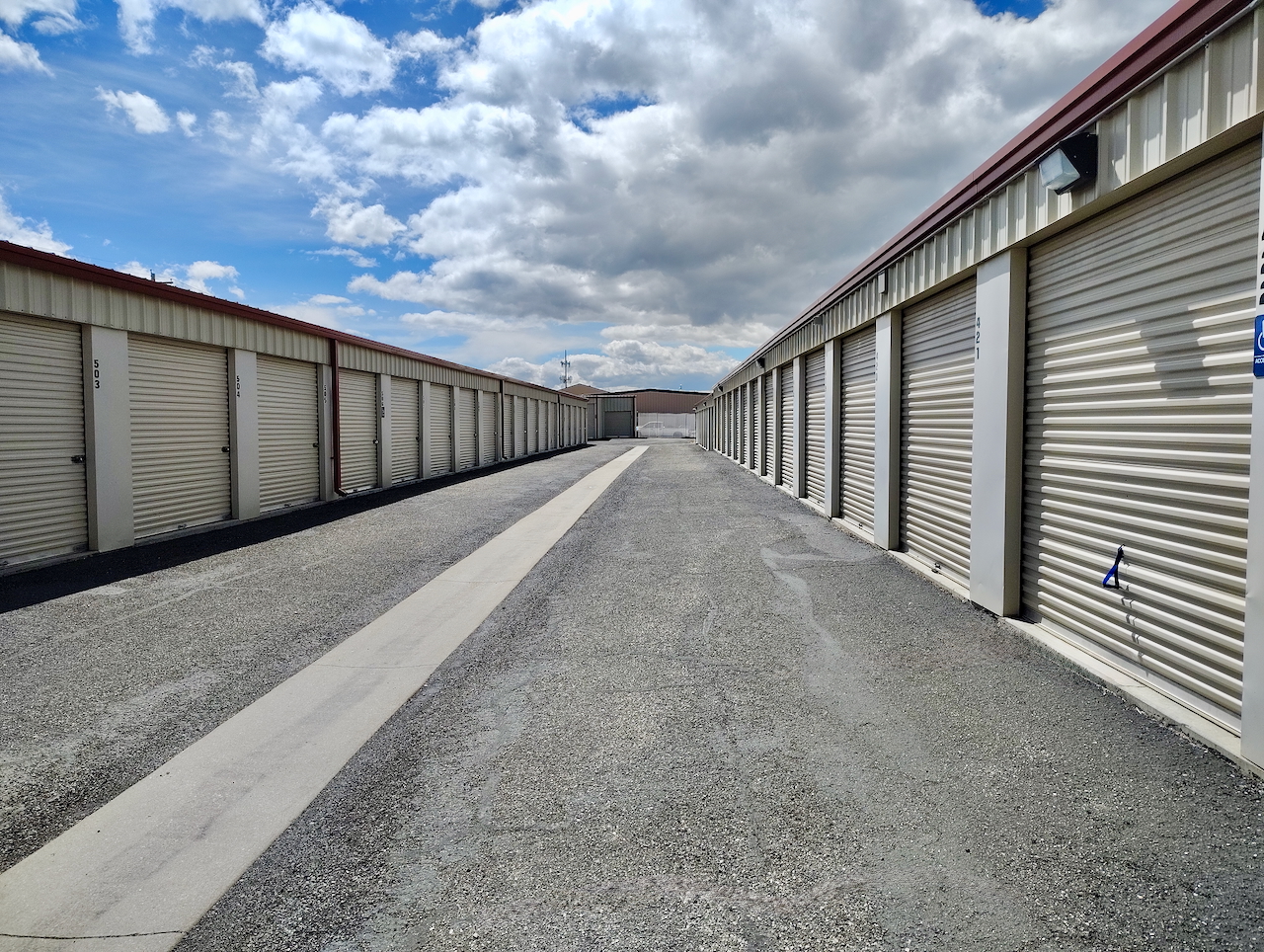 Outdoor drive-up storage unit at 3207 N 750 E, Layton, UT with security fence