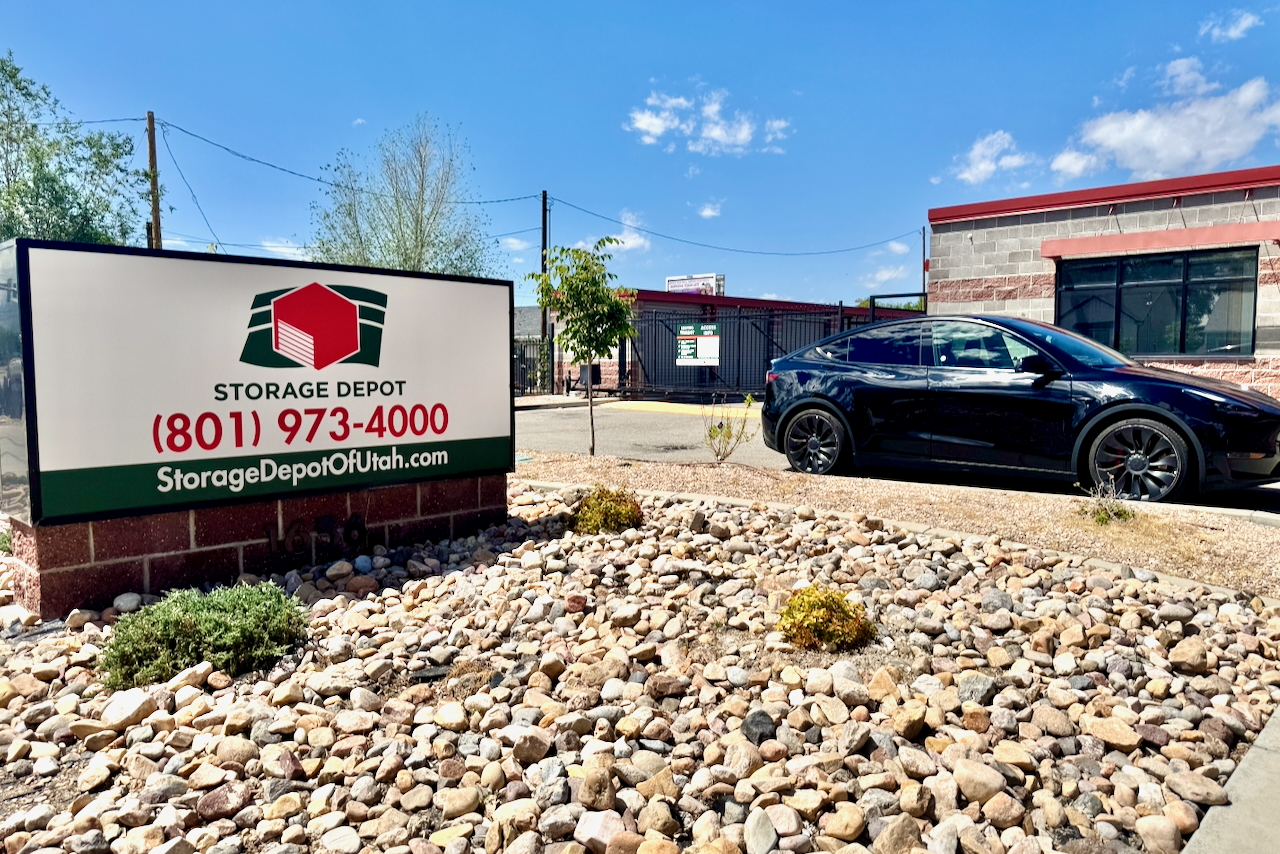 Storage Depot facility sign at 1656 West Whitlock Avenue, West Valley, Utah, highlighting climate-controlled and drive-up storage