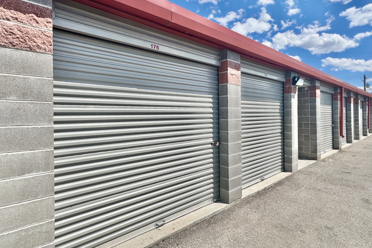 Exterior view of drive-up storage at Storage Depot, 84119, with secure fencing and convenient month-to-month leasing