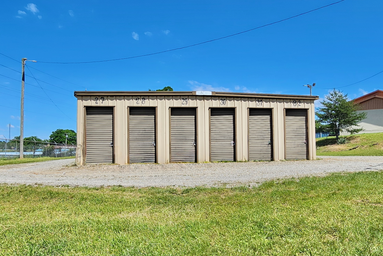 Secure outdoor storage unit with roll-up door at Storage Depot, Catherine Avenue, Monteagle, Tennessee, for easy vehicle access.