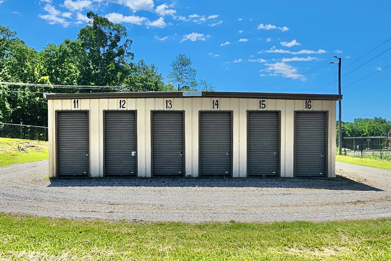 Outdoor drive-up storage units at Storage Depot on Catherine Avenue, Monteagle, TN, with secure gate access and well-lit premises.