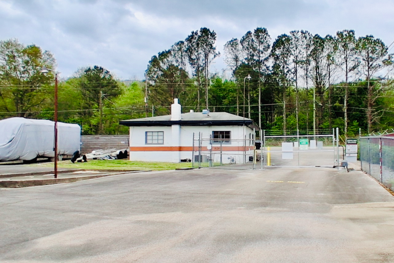 Secure front gate at Storage Depot in Birmingham, AL, providing controlled access to drive-up and RV storage units.
