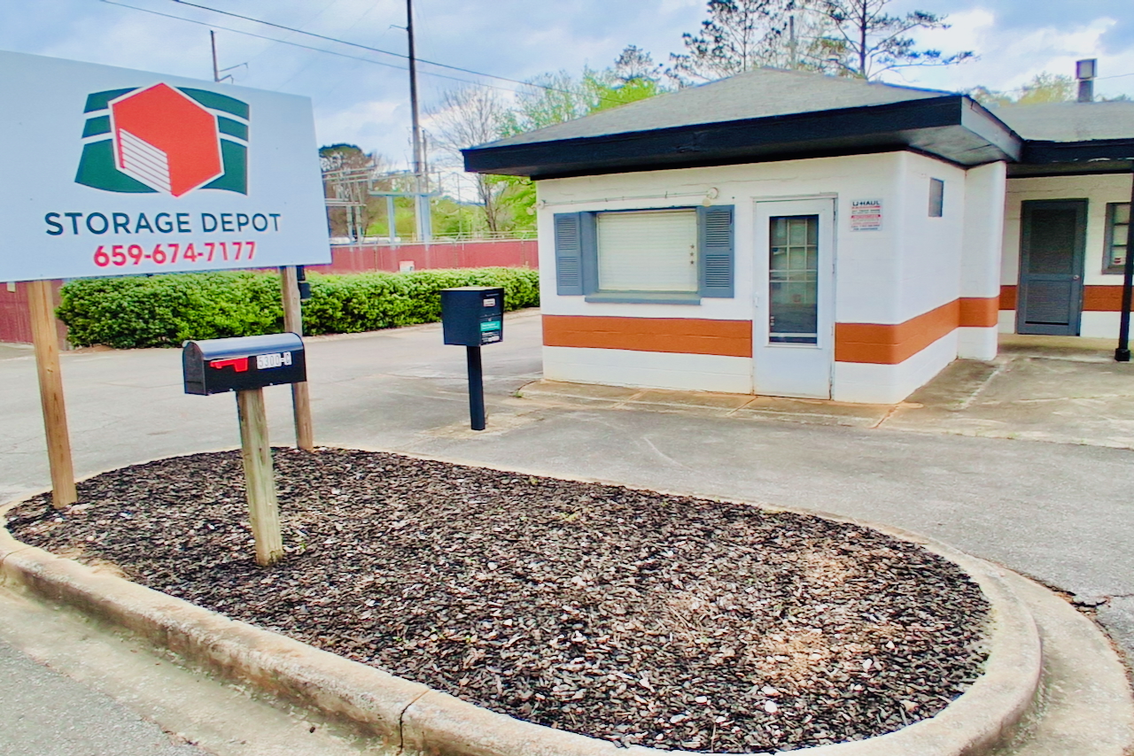 Well-lit entrance gate at Storage Depot, Cahaba Valley Road, Birmingham, Alabama, for safe facility access