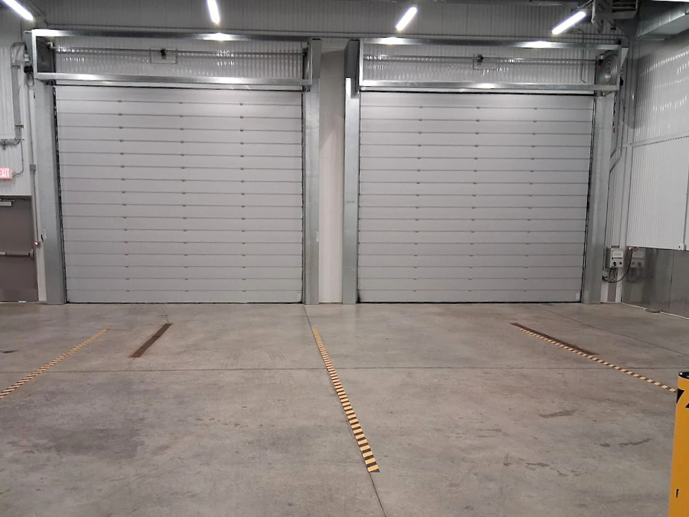 Interior loading area with large garage doors