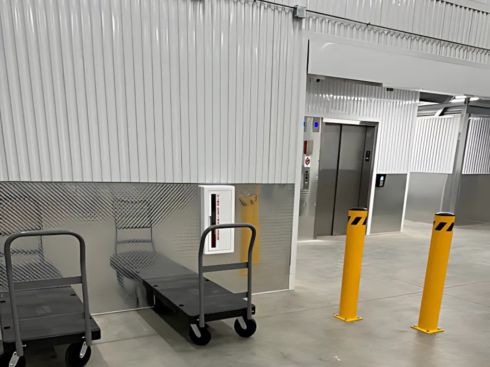 Loading carts and bollards in indoor loading zone