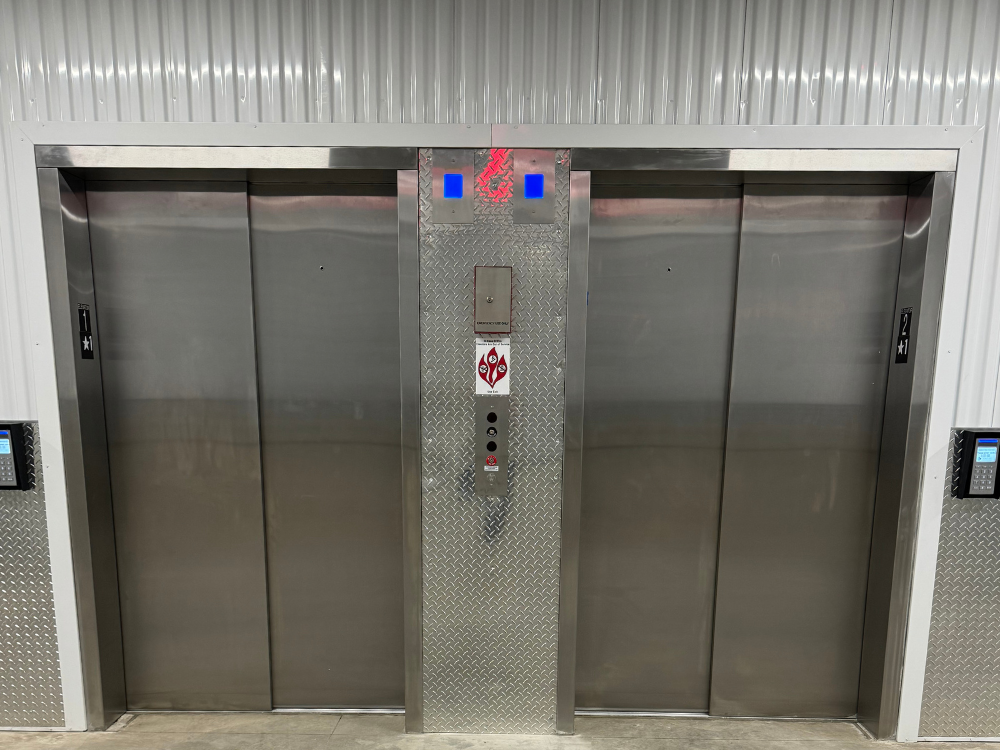 Elevator access for multi-floor storage facility