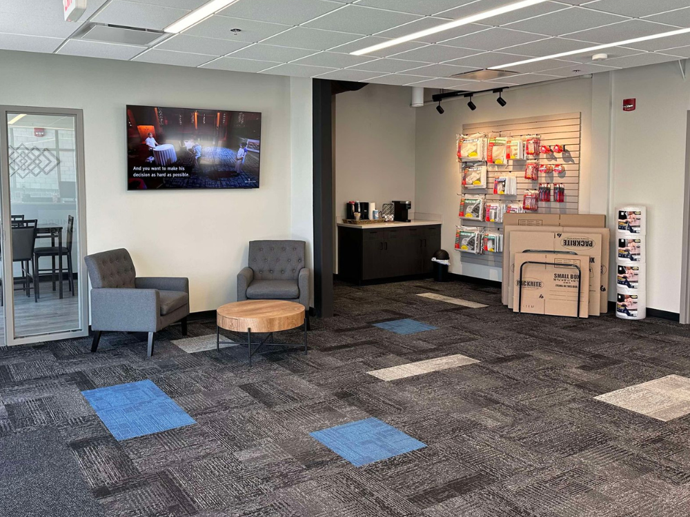 Lobby area of storage facility with welcome signage