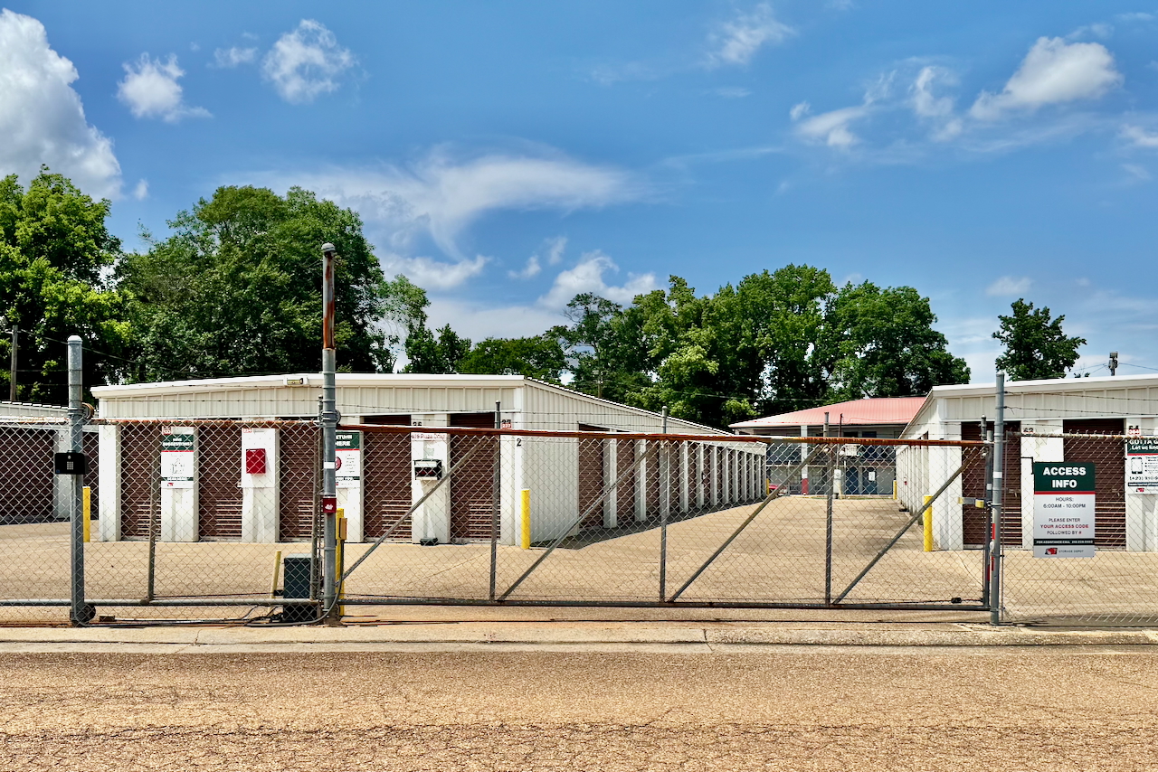 Secure front gate at Storage Depot, 126 Plaza Drive, Mansfield LA 71052, with fenced perimeter for safe residential and business storage