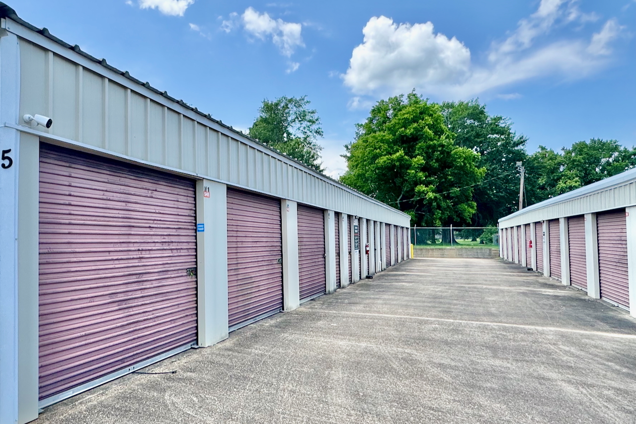 Exterior view of drive-up access storage in DeSoto Parish, climate-controlled options available for residential items